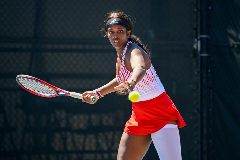 Graduate Alana Smith keeps her eyes on the ball as she prepares to take a swing during her singles match at J.W. Isenhour Tennis Center on Sunday, April 2, 2023. Smith won her singles match. NC State beat Boston College 7-0.