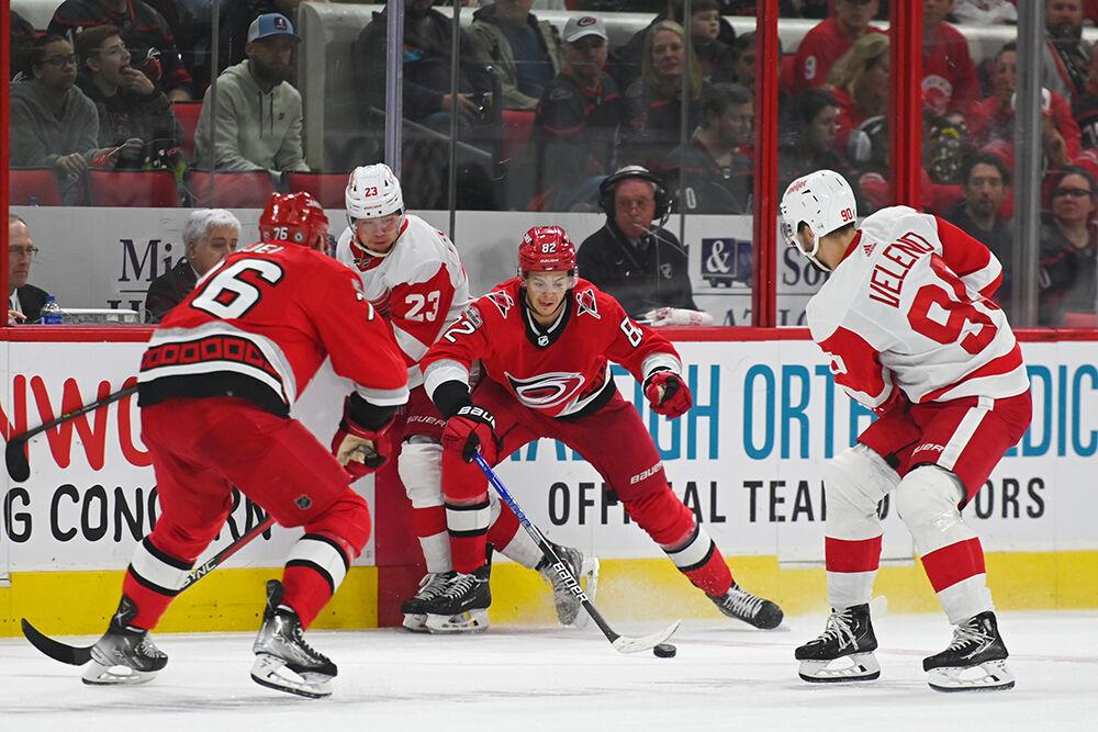 Carolina Hurricanes center Jesperi Kotkaniemi goes after the puck during the game against the Detroit Red Wings in PNC Arena on Tuesday, April 11, 2023. The Hurricanes won 4-1.