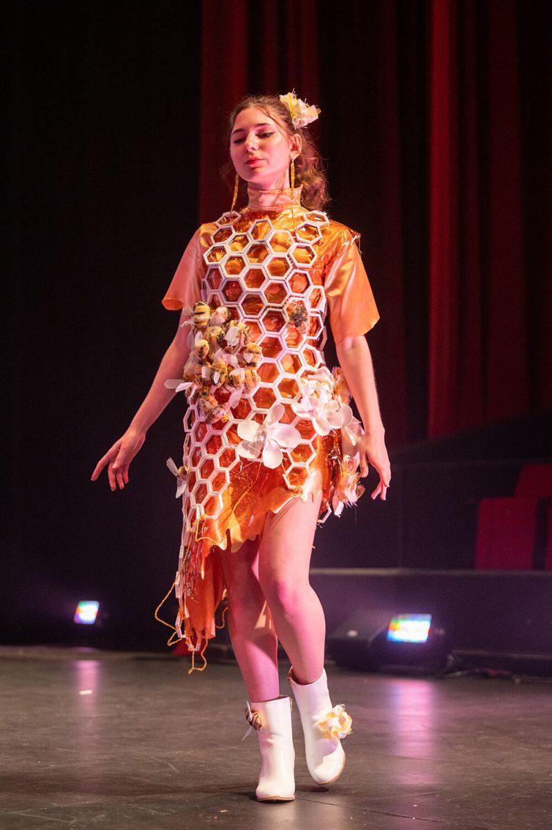 Victoria Romanova, a first-year in exploratory studies, wears designer Ellie Baker during the Art2Wear dress rehearsal at Stewart Theatre on Tuesday, April 25, 2023. The collection was titled "Viva Naturalis" and features 3D printed elements into the design.