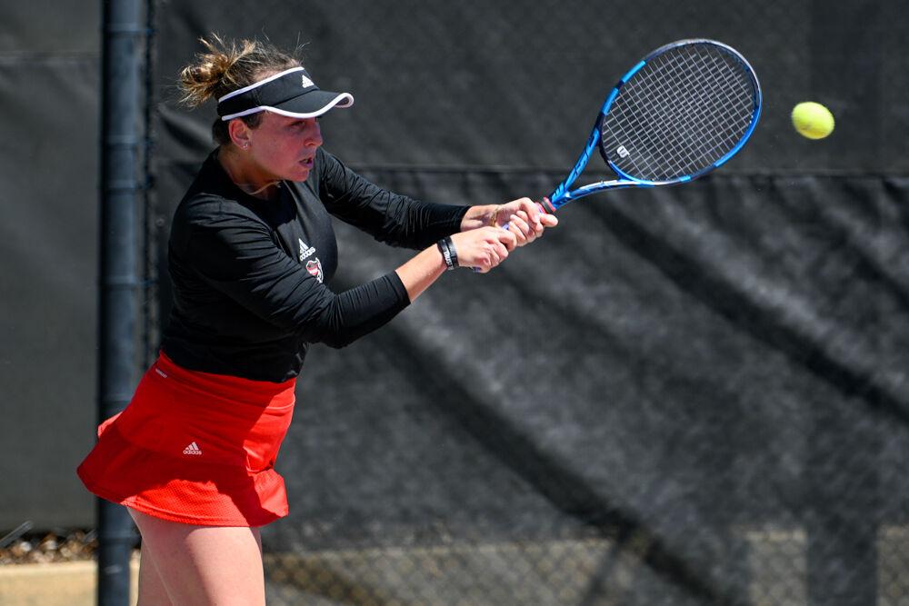 Junior Abigail Rencheli takes a swing at the ball during her singles match at J.W. Isenhour Tennis Center on Sunday, April 2, 2023. Rencheli won her singles match. NC State beat Boston College 7-0.