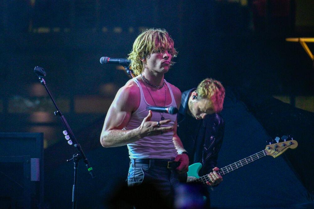 Ross Lynch tosses the mic up during the performance at Wolfstock at Stafford Commons on Saturday, April 22, 2023. Ross Lynch performed alongside his brother Rocky Lynch at Wolfstock.
