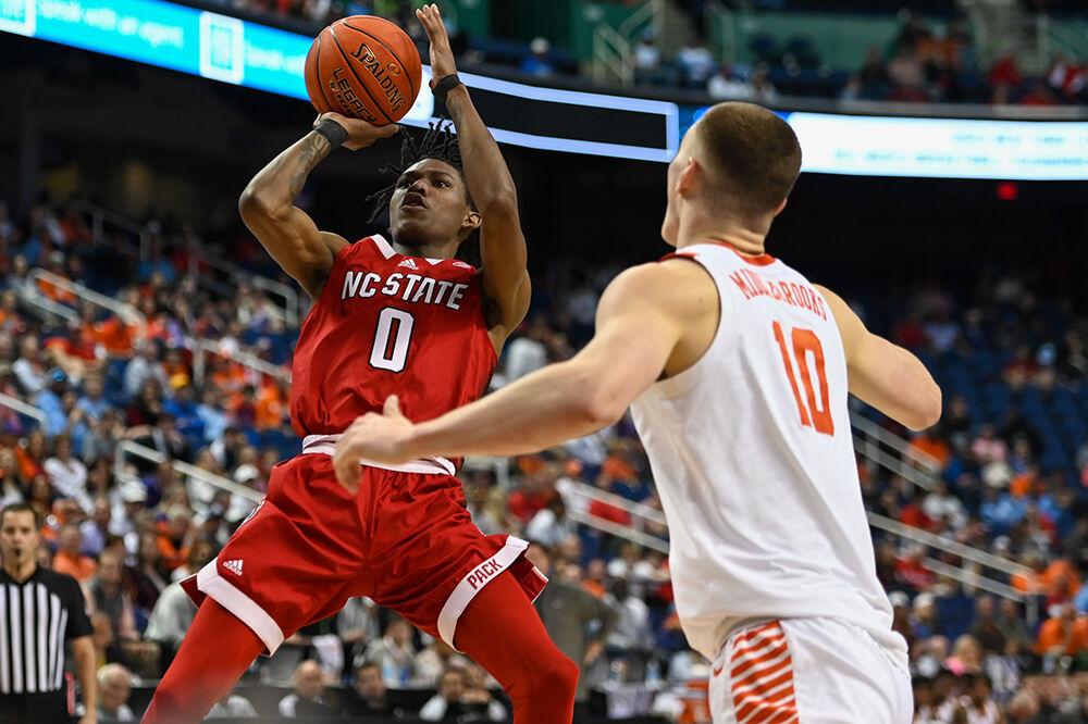 Sophomore guard Terquavion Smith goes up for a quick jumper during the quarterfinal game of the Men's ACC Tournament versus the Clemson Tigers in Greensboro Coliseum on Thursday, March 9, 2023. Smith scored 11 points against Clemson. Clemson beat NC State 80-54.