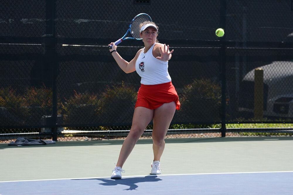 Junior Abigail Rencheli forehands the ball at the match against Florida State University at Cary Tennis Park for the first day of the 2023 ACC Women's Tennis Championships on Friday, April 21, 2023. Rencheli won her singles match. The Wolfpack beat the Seminoles 4-0.