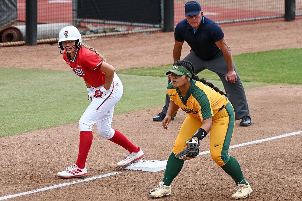 Sophomore infielder Taylor Ensley watches the batter and prepares to run to home plate during the game against Norfolk State at Dail Softball Stadium on Wednesday, April 6, 2023. Ensley had two hits and scored one run for the Wolfpack. NC State beat Norfolk State 10-1.