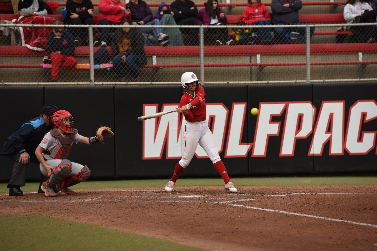 Sophomore infielder Hannah Goodwin swings the bat during the game against the Radford Highlanders in Dail Softball Stadium on Wednesday, March 22, 2023. Goodwin hit a walk-off home run to win the game. The Wolfpack won 8-7.