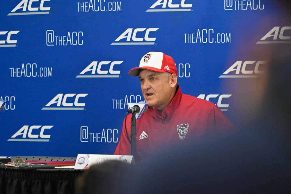 Head coach Elliott Avent shares a few words after the ACC Tournament game against Miami at Durham Bulls Athletic Park on Thursday, May 25, 2023. NC State lost to Miami 4-2.