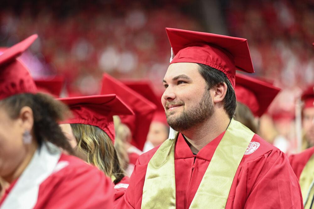 JD Shropshire, a fourth-year studying in aerospace engineering, happily gazes during&#160;the Spring Commencement Ceremony in PNC Arena on Saturday, May 6, 2023. Over 6,000 graduates were in attendance.
