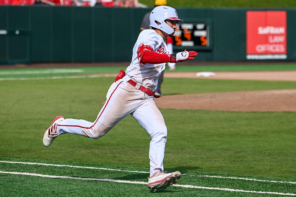 Junior infielder Kalae Harrison rounds first base during the game against NC A&amp;T at Doak Field at Dail Park on Tuesday, May 2, 2023. Harrison scored one run for the Wolfpack. NC State beat NC A&amp;T 6-5.