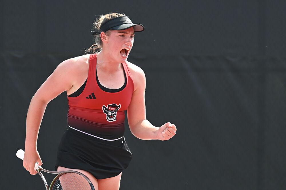 Junior Amelia Rajecki cheers after scoring a point during the second round match of the NCAA Tournament at Dail Outdoor Tennis Stadium on Saturday, May 6, 2023. Rajecki won her singles match 6-4, 6-0. NC State beat Kansas 4-0.