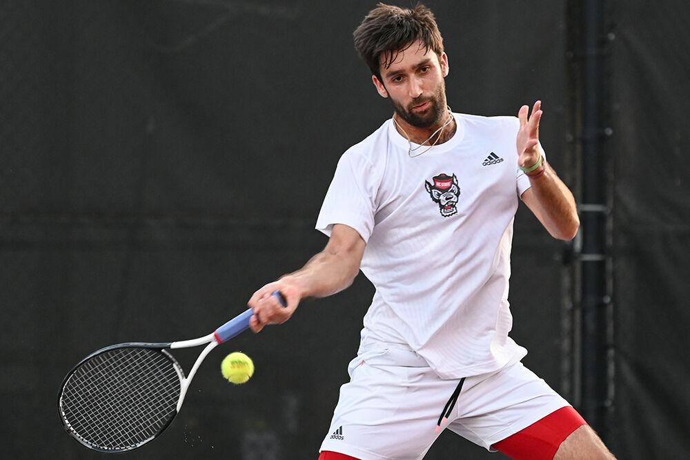 Graduate Rafa Izquierdo Luque forehands the ball during the match against Wake Forest at Dail Outdoor Tennis Stadium on Wednesday, April 12, 2023. Luque won his doubles match 7-5. NC State beat Wake Forest 4-2.