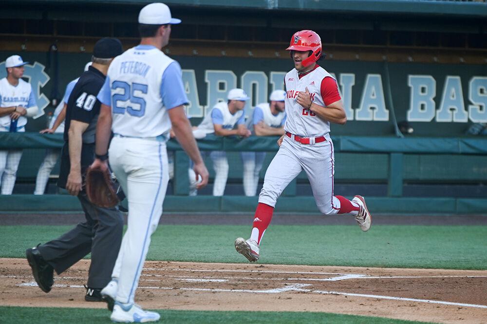 Graduate outfielder Trevor Candelaria runs to home plate during the game against UNC-Chapel Hill at Bryson Field at Boshamer Stadium on Thursday, May 11, 2023. Candelaria had one hit and one scored run throughout the game. NC State lost 9-8.