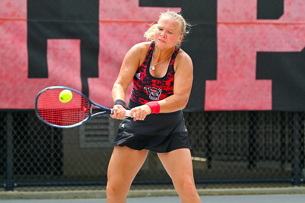 Freshman Diana Shnaider hits the ball during the match against Virginia Tech at&#160;Dail Outdoor Tennis Stadium on Sunday, April 16, 2023. Shnaider won her doubles and singles matches. NC State beat Virginia Tech 7-0.