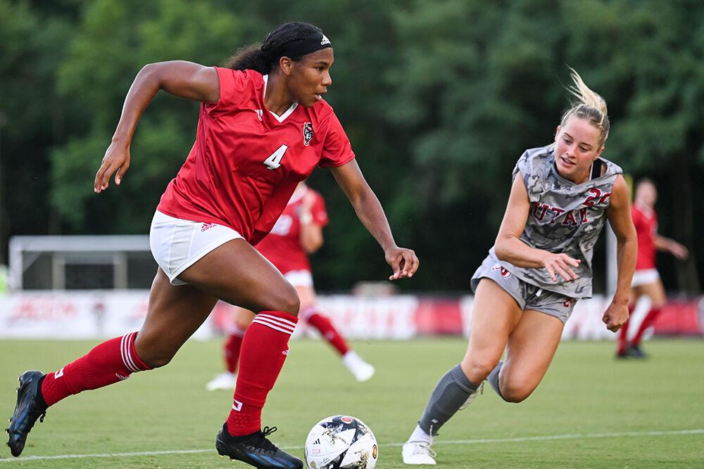 Senior forward Leyah Hall-Robinson dribbles the ball down the field during the match against Utah at Dail Soccer Field on Thursday, Aug. 17, 2023. Hall-Robinson made one assist for the Wolfpack. NC State and Utah tied 1-1.
