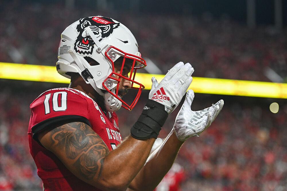 Senior safety Tanner Ingle celebrates during the Wolfpack's home football game against the Florida State Seminoles on Saturday, Oct. 8, 2022 at Carter-Finley Stadium. The Wolfpack beat the Seminoles 19-17.