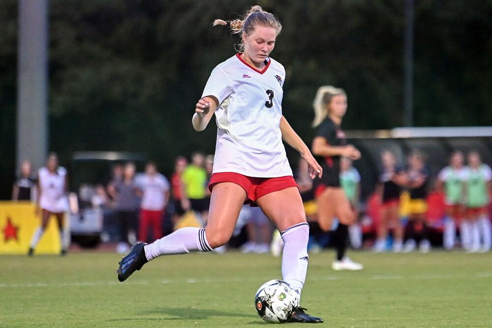 Junior defender Brianna Weber passes the ball during the match against Rutgers at Dail Soccer Field on Thursday, Aug. 24, 2023. Weber had 1 shot on a goal for the Wolfpack. NC State and Rutgers tied 1-1.