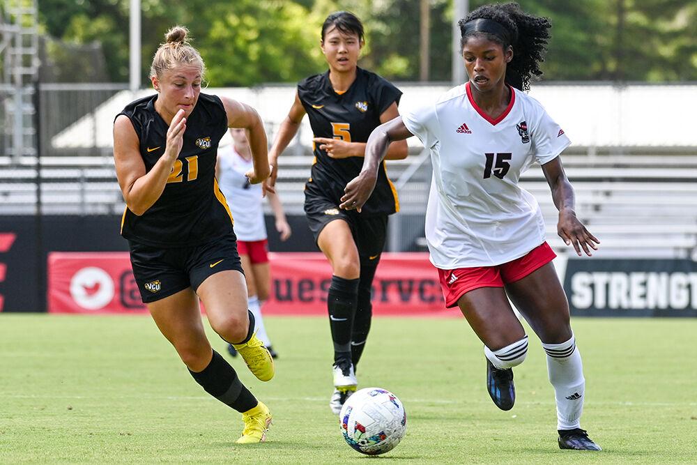 Senior forward Jameese Joseph dribbles the ball down the field during the exhibition match against VCU at Dail Soccer Field on Saturday, Aug. 12, 2023. NC State lost 1-0 to VCU.