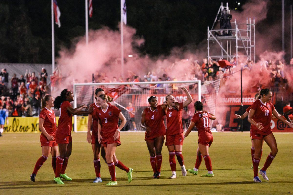 The NC State Women's team rejoices at their goal in the last minute of the match versus the Campbell Camels on Thursday, Aug. 25, 2022 in Dail Soccer Field. The Wolfpack beat the Camels 1-0.