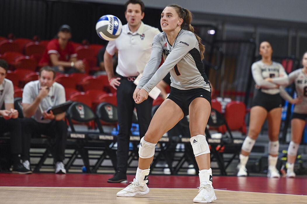 Freshman outside hitter Ava Brizard sets the ball during the game against Indiana on Thursday, Sept. 8, 2022 in Reynolds Coliseum. Ava scored seven kills. NC State beat Indiana 3-0.