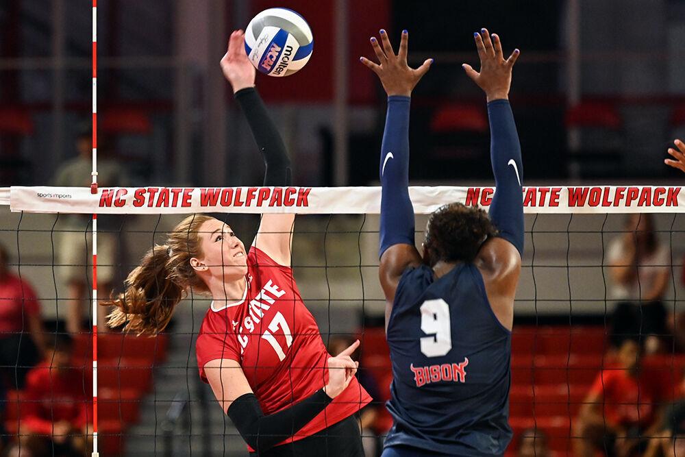 Junior opposite hitter Amanda Rice spikes the ball during the game against Howard University in Reynolds Coliseum on Thursday, Aug. 31, 2023. Rice had 13 kills for the Wolfpack. NC State beat Howard University 3-1.