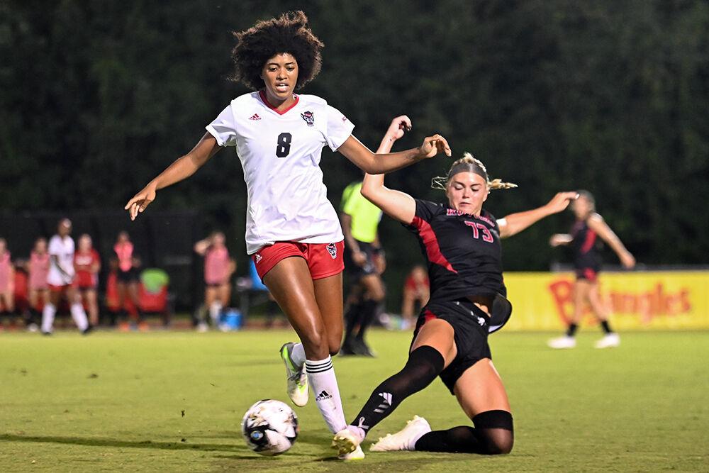 Freshman midfielder Roselie Olou fights for possession of the ball during the match against Rutgers at Dail Soccer Field on Thursday, Aug. 24, 2023. NC State and Rutgers tied 1-1.