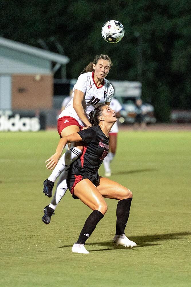 Junior midfielder Annika Wohner heads the ball against the Rutgers Scarlet Knights in Dail Soccer Field on Thursday, Aug. 24, 2023. Wohner scored a goal in the 87th minute to secure a tie with Rutgers. NC State tied with Rutgers 1-1.