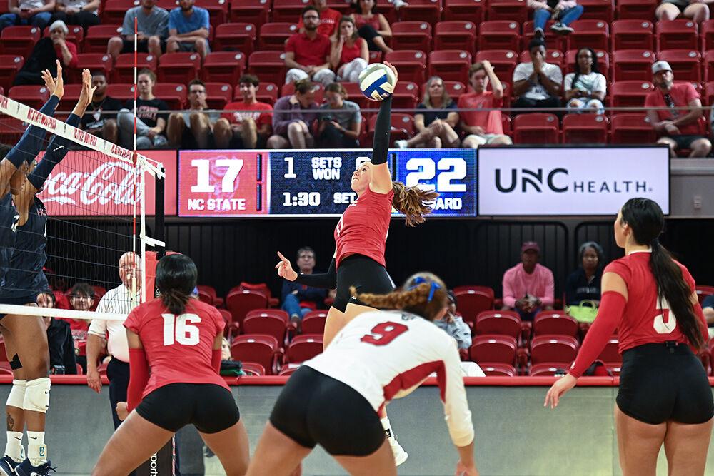 Junior opposite hitter Amanda Rice&#160;spikes the ball during the game against Howard University&#160;in Reynolds Coliseum on Thursday, Aug. 31, 2023. NC State beat Howard University 3-1.