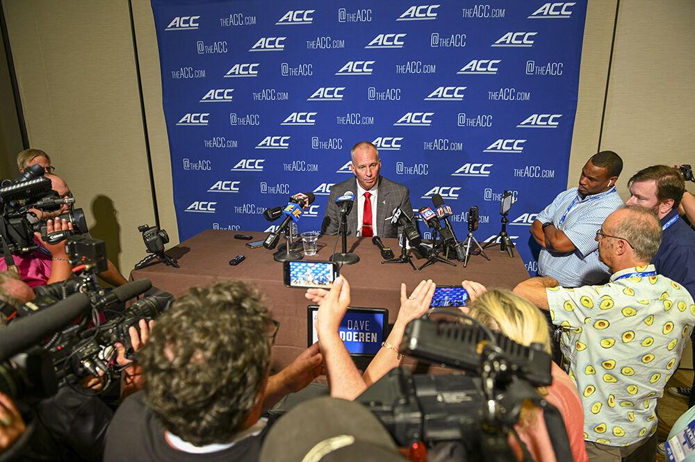 Interviewers surround head coach Dave Doeren during the 2023 ACC Kickoff at The Westin Charlotte in Charlotte, NC,&#160;on Thursday, July 27, 2023. In the interviews, Doeren reflected on struggles the team experienced this past season and their expectations for the future.