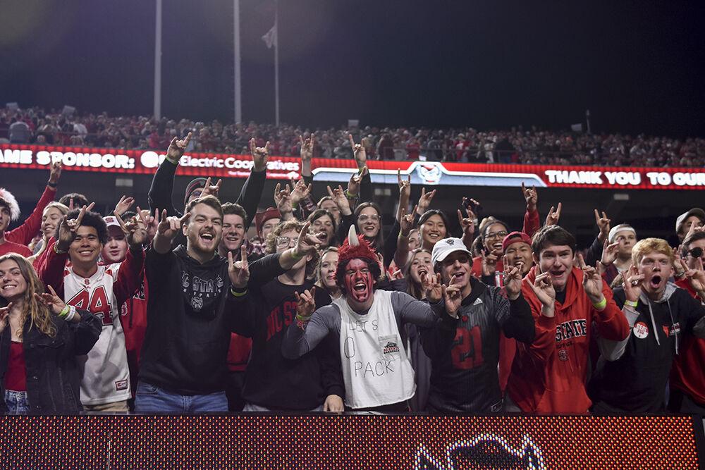 NC State fans cheer while being on the big screen during the game against Florida State University at Carter-Finley Stadium on Saturday, Oct. 8, 2022. The Wolfpack beat the Seminoles 19-17.