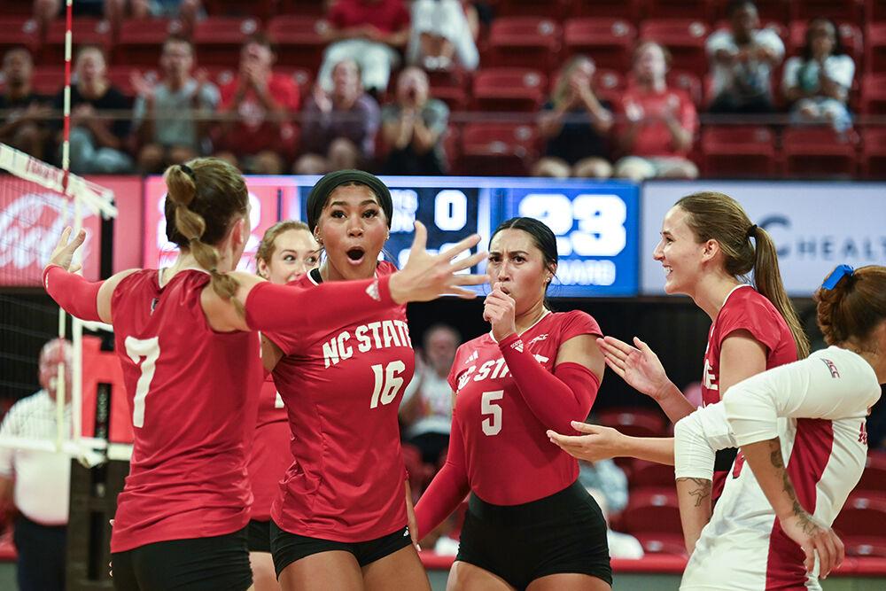 The volleyball team celebrates a kill during the game against Howard University&#160;in Reynolds Coliseum on Thursday, Aug. 31, 2023. NC State had a total of 55 kills. NC State beat Howard University 3-1.