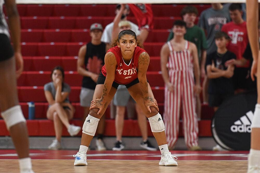 Senior libero Skye Stokes prepares to receive the ball during the match against Winthrop in Reynolds Coliseum on Saturday, Sept. 2, 2023. NC State beat Winthrop 3-0. Stokes made four aces.