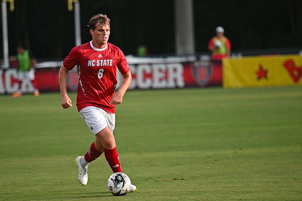 Junior midfielder Will Buete moves the ball down the field at the match against Boston College at Dail Soccer Field on Friday, Sept. 8, 2023. Buete attempted one shot on goal and two shots total. The Wolfpack won against the Eagles 2-0.