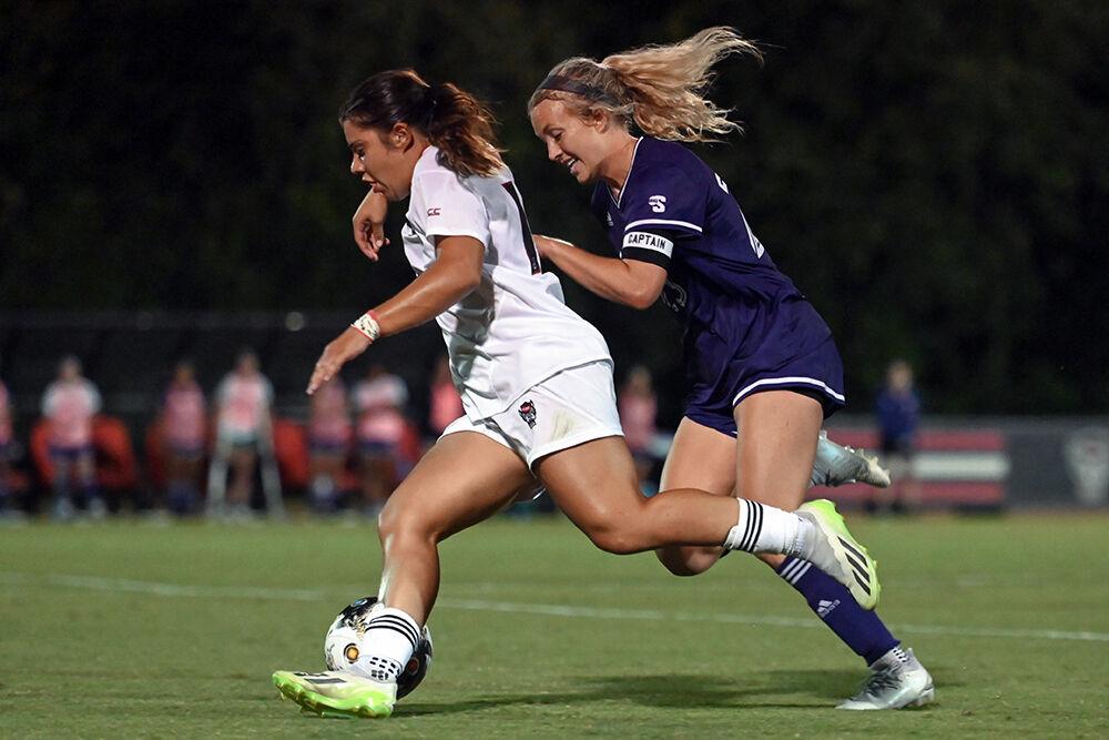 Junior defender Fernanda Soto blocks a pass during the match against High Point at Dail Soccer Field on Thursday, Sept. 14, 2023. Soto made one assist for the Wolfpack. NC State and High Point tied 2-2.
