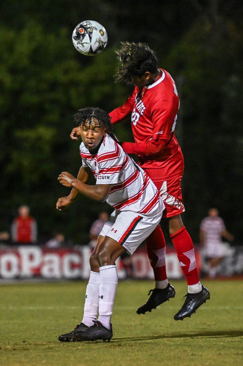 Sophomore defender Jonathan Cisneros heads the ball over the Gardner-Webb offense at Dail Soccer Field on Wednesday, Sept. 27, 2023. The Wolfpack beat the Bulldogs 3-1.