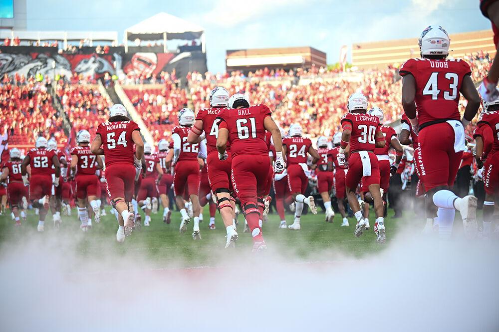 The NC State football team takes the field on Saturday, Nov. 12, 2022 at Carter-Finley Stadium. NC State lost to Boston College 21-20.