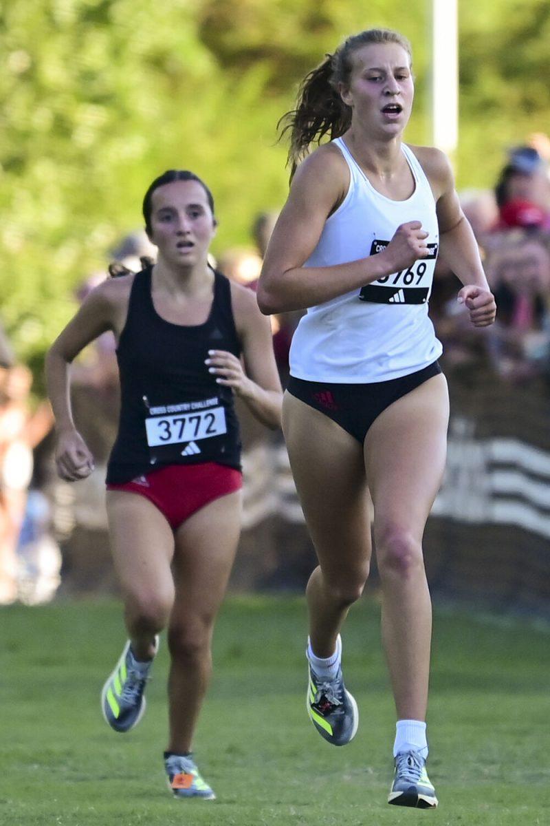 Freshman runner Angelina Napoleon races to the finish, followed by freshman runner Jolena Quarzo at the Adidas XC Challenge at WakeMed Soccer Park on Sept. 15, 2023. Napoleon and Quarzo individually placed second and third in the 5k event.