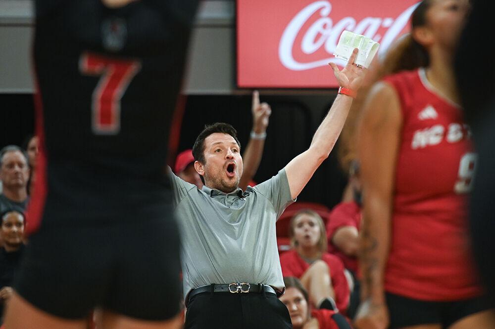 Head coach Luka Slabe shouts in celebration during the match against Winthrop in Reynolds Coliseum on Saturday, Sept. 2, 2023. NC State beat Winthrop 3-0.