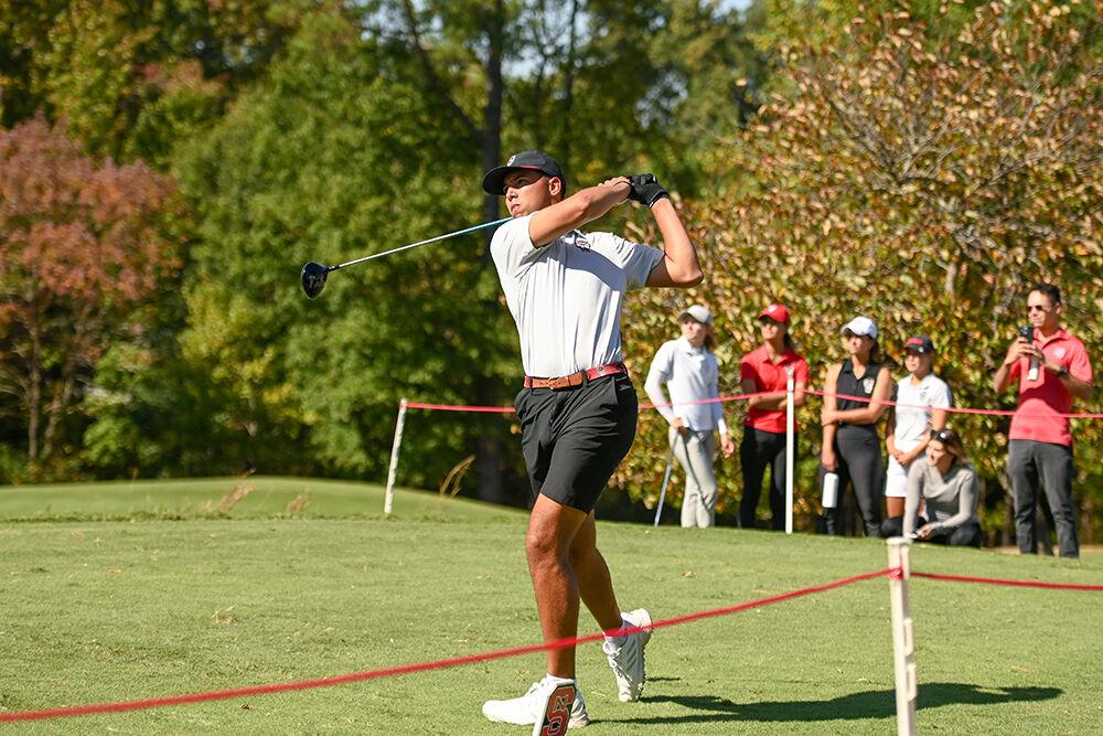 Junior Spencer Oxendine drives the golf ball during the Wolfpack Intercollegiate on Saturday, Oct. 15, 2022,&#160;at the Lonnie Poole Golf Course. Oxendine tied for 50th place and was nine-over par. NC State tied for second.