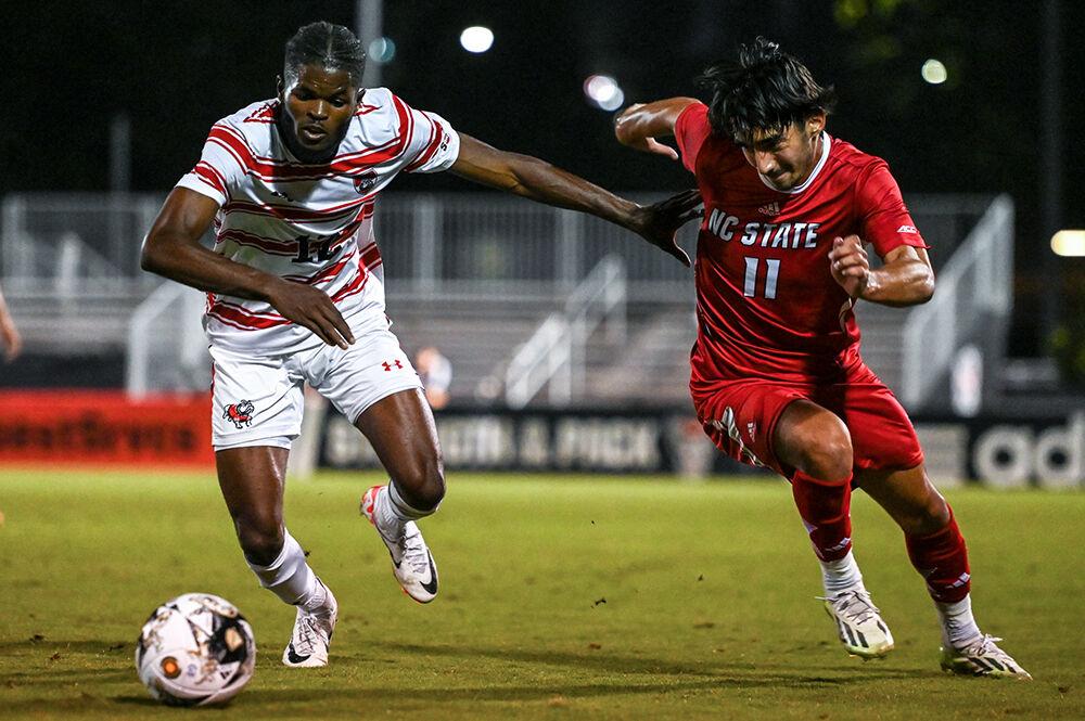 Senior forward Henrique Santos chases down the ball during the match versus Gardner-Webb at Dail Soccer Field on Wednesday, Sept. 27, 2023. The Wolfpack beat the Bulldogs 3-1.