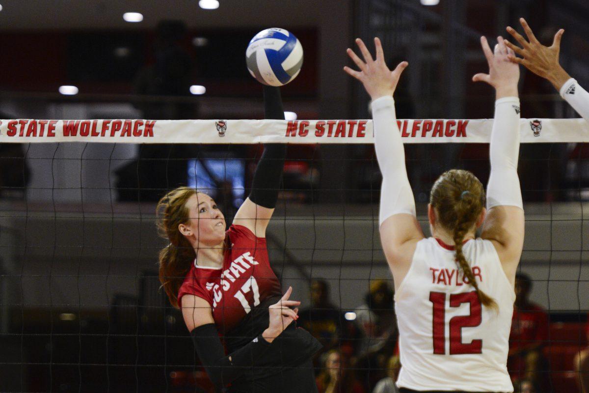 Junior opposite hitter Amanda Rice spikes the ball during the match against Rutgers in Reynolds Coliseum on Friday, Sept. 1, 2023. Rice made 18 kills. The Wolfpack beat the Scarlet Knights 3-2.&#160;