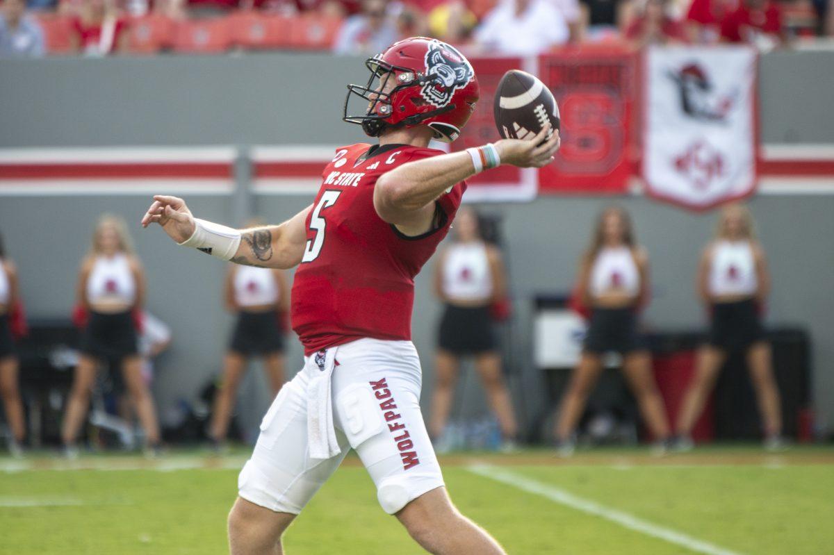 Graduate quarterback Brennan Armstrong throws the ball during the football game against Virginia Military Institute in Carter-Finely Stadium on Saturday, Sept. 16, 2023. Armstrong threw for 264 yards and one touchdown. The Wolfpack beat the Keydets 45-7.