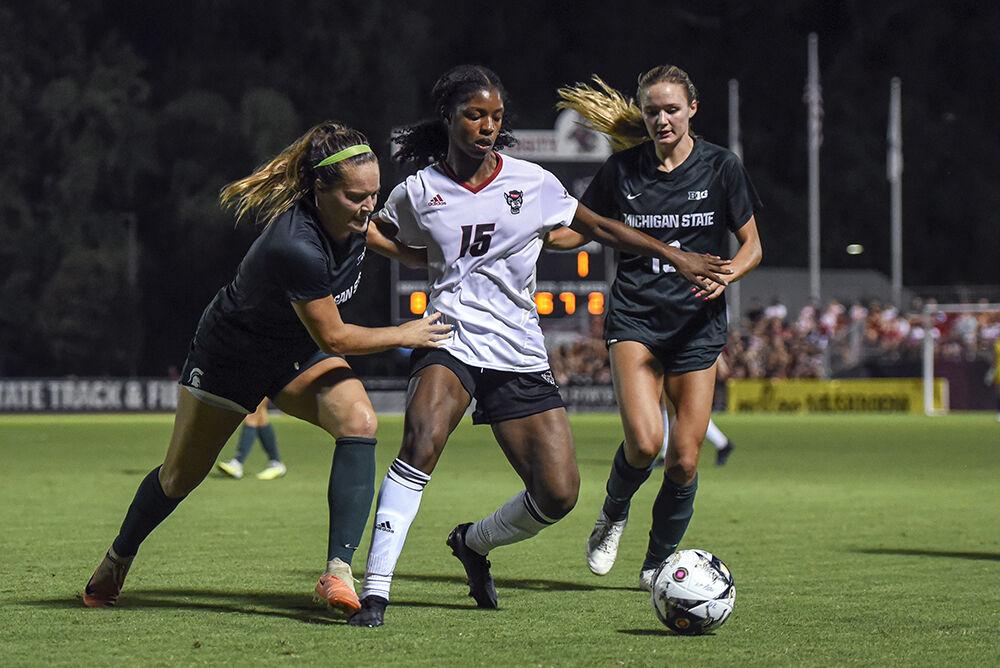 Senior forward Jameese Joseph fights for control of the ball during the match against Michigan State at Dail Soccer Field on Thursday, Sept. 7, 2023. Joseph attempted six shots and scored one goal. The Wolfpack lost to the Spartans 2-1.