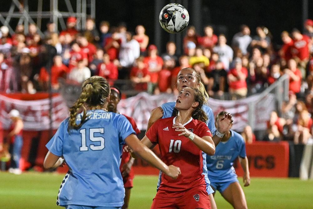 Junior midfielder Annika Wohner eyes the ball as she sets up for a header during the match against UNC-Chapel Hill on Saturday, Sept. 30, 2023. For the second time this season, NC State has set a new attendance record for women's soccer with 3,972 people. NC State lost 4-0 to Chapel Hill.
