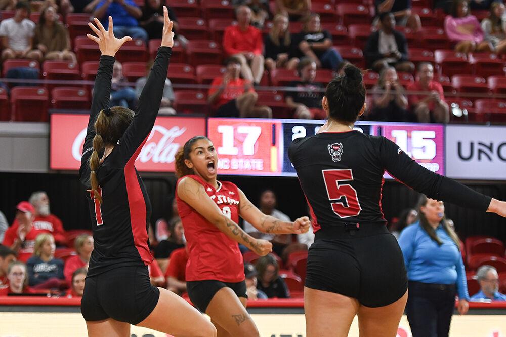 Senior libero Skye Stokes celebrates with her teammates during the match against Winthrop in Reynolds Coliseum on Saturday, Sept. 2, 2023. NC State beat Winthrop 3-0. Stokes made four aces.