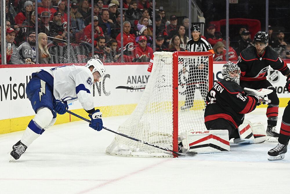 Carolina goaltender Pyotr Kochetkov extends to block a Tampa Bay wrap around shot during the Hurricanes' home game against the Lightning in PNC Arena on Tuesday, March 28, 2023. The Lightning beat the Canes 4-0.