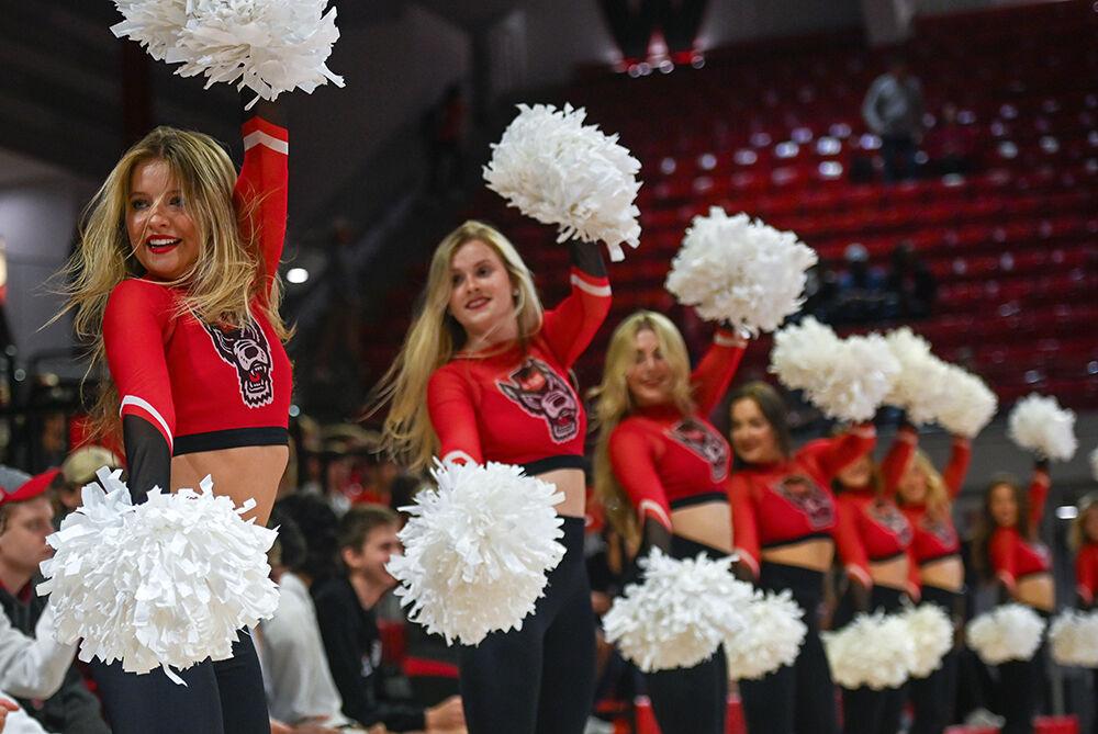 The NC State dance team performs during the match against Pitt at Reynolds Coliseum on Friday, Oct. 20, 2023. NC State lost to Pitt 3-0.