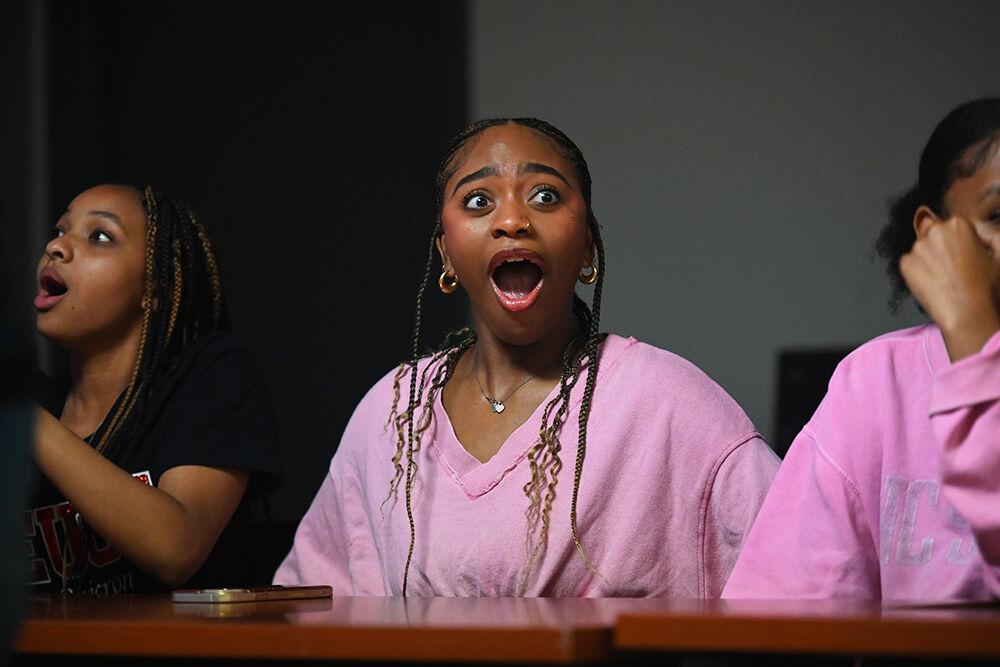 (From left) Tiara Baker, a fourth-year studying political science, and Jada Williams, a fourth-year studying fashion and textile management, are visibly surprised during Family Feud at Witherspoon Student Center on Friday, Oct. 6, 2023. This was one of the many events held during National Pan-Hellenic Council Week at NC State.