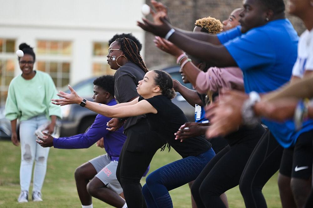 Students play egg toss during the NPHC Olympic Games at Stewardship Park on Wednesday, Oct. 4, 2023. NPHC Week consist of collaborated events from organizations in the National Pan-Hellenic Council on NC States campus.