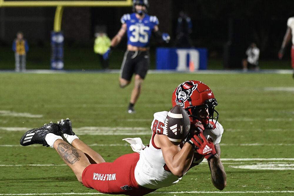Redshirt sophomore wide reciever Anthony Smith dives and drops a deep ball from quarterback MJ Morris during the Wolfpack's game against the Duke Blue Devils at Wallace Wade Stadium on Saturday, Oct. 14, 2023. The Blue Devils defeated the Wolfpack 24-3.
