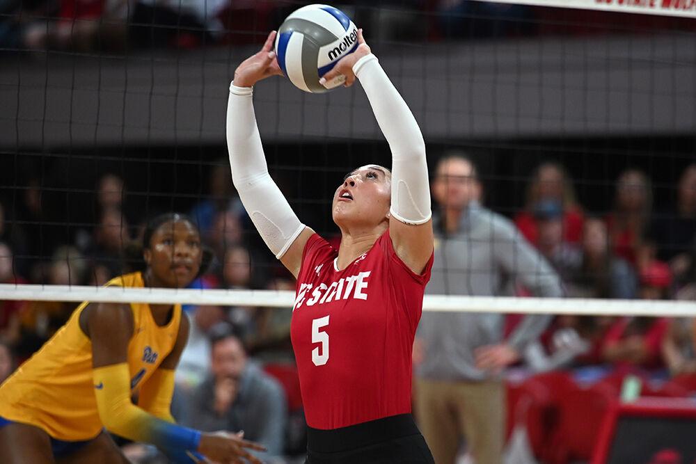 Graduate setter Kristen McDaniel sets the ball during the match against Pitt at Reynolds Coliseum on Friday, Oct. 20, 2023. NC State lost to Pitt 3-0.