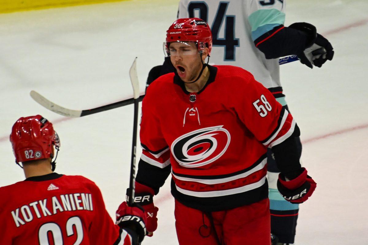 Carolina Hurricanes left wing Michael Bunting celebrates a Hurricanes goal during the game against the Seattle Kraken in PNC Arena on Thursday, Oct. 26, 2023. Bunting had one assist and two shots during the game. The Hurricanes beat the Kraken 3-2 in overtime.